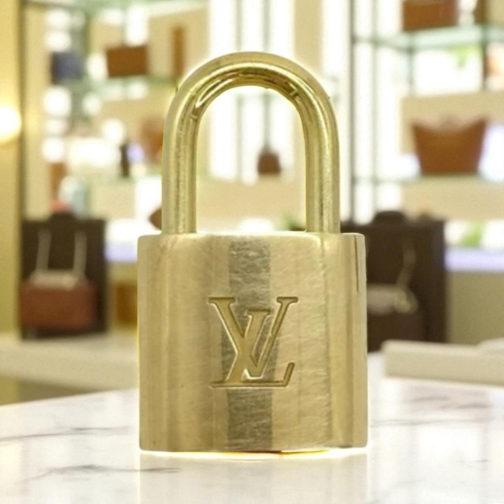 Louis Vuitton Gold padlock with unbranded chain